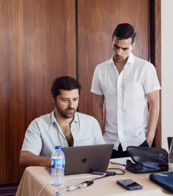 Altar Co-Founder, Daniel and CMO, Rui, Working on a presentation